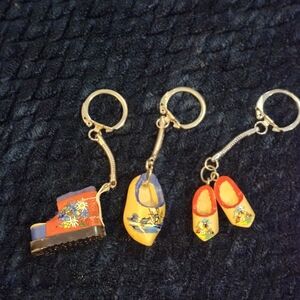 Vintage miniature keychains representing traditional Dutch wooden shoes